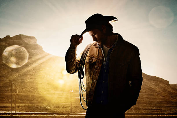 istock Cowboy looking down outdoors 638656390