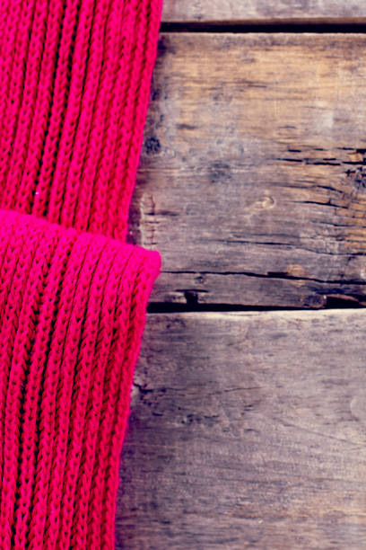 istock knitted plaid, sweater on old wooden boards 638656756