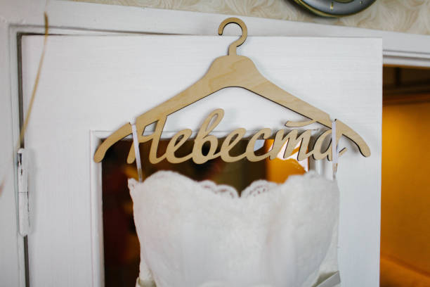 istock Wedding dress hanging on a hanger 638658482