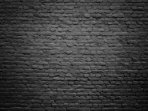 istock texture of a black brick wall, dark background for design 638659158