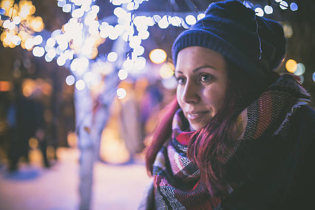 istock woman in night winter city 638664268