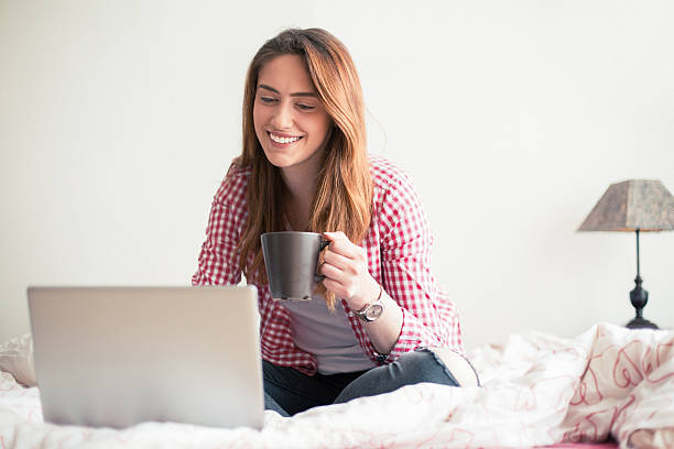 istock Girl waking up with cup of coffee 638664936
