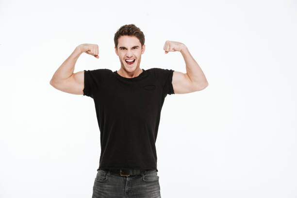 istock Attractive young man showing his biceps. 638665036