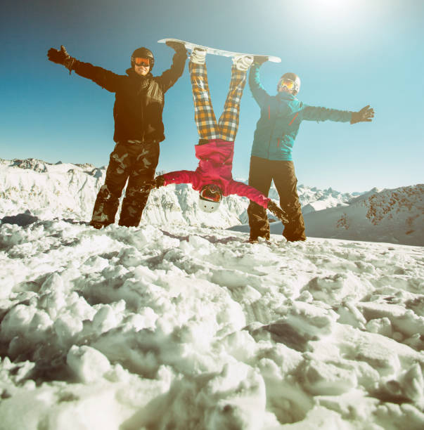 istock Group friends snowboarders have fun on the slope 638666500