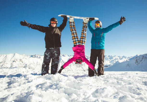 istock Group friends snowboarders have fun on the slope 638666712