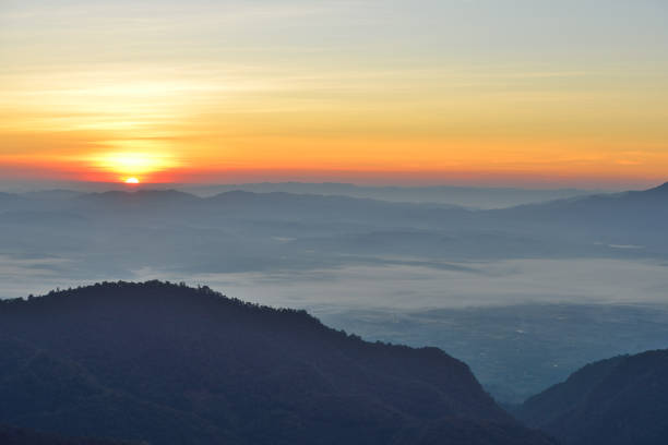 istock Sun rising on the sky over beautiful mountains 638667766