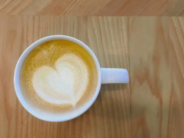Photo of Decorated coffee with heart on the top