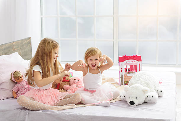istock Happy children playing together in bedroom 638670556
