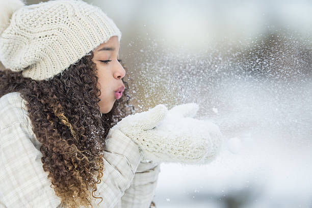 playing with snow outside - coat warm clothing one person joy imagens e fotografias de stock