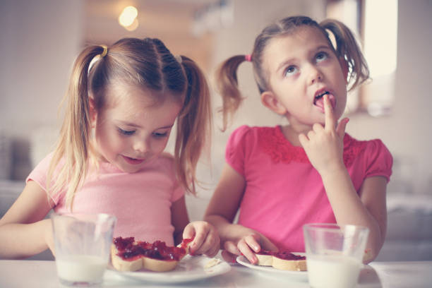 istock Girls eating breakfast. 638671322