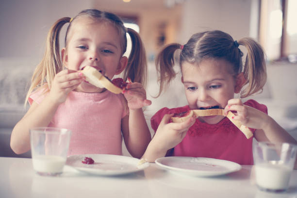 istock Girls eating breakfast. 638671496