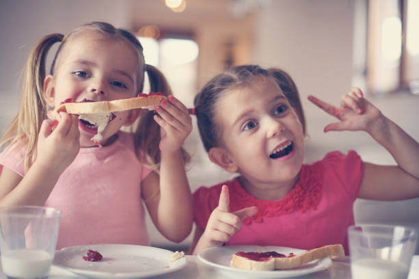 istock Girls eating breakfast. 638671662