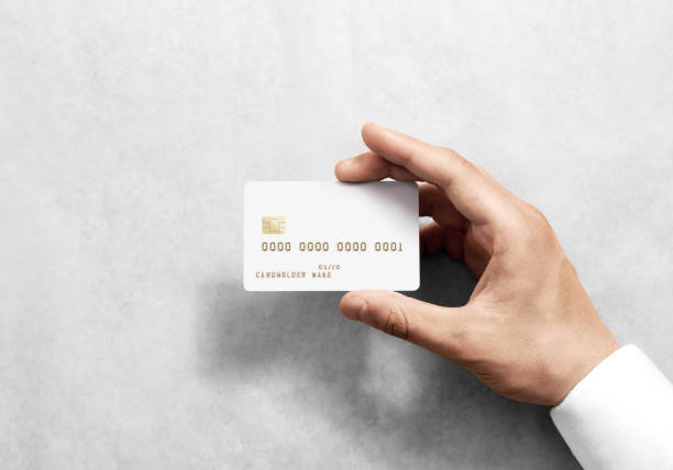 istock Hand holding blank white credit card mockup with chip 638672502