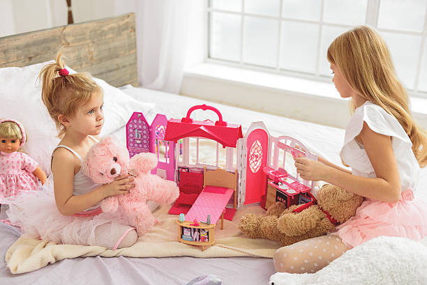 istock Happy two kids having fun with toys 638673990