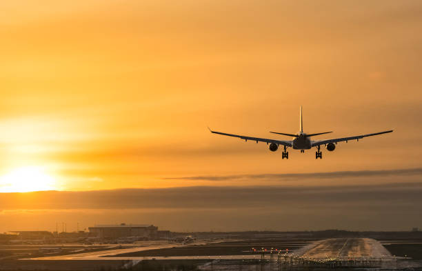 istock Airplane landing to airport runway 638674230