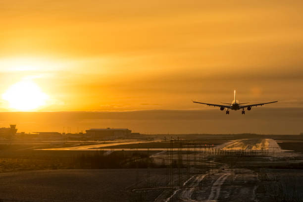 istock Airplane landing to airport runway 638674586