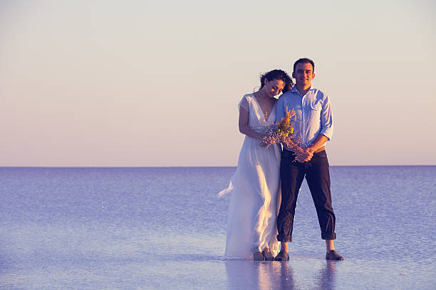 istock Newlyweds in Salt lake, Turkey 638675158