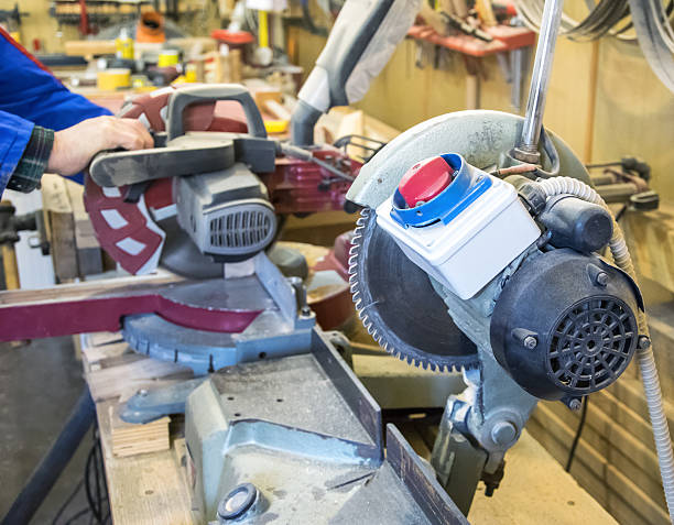 istock Carpenter workplace- Man using circular saw to cut wood 638677138