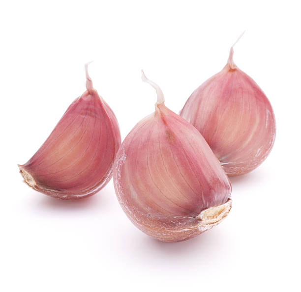 istock Garlic clove isolated on white background cutout 638678370