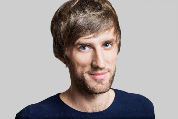 istock Cheerful smiling young man portrait 638680344