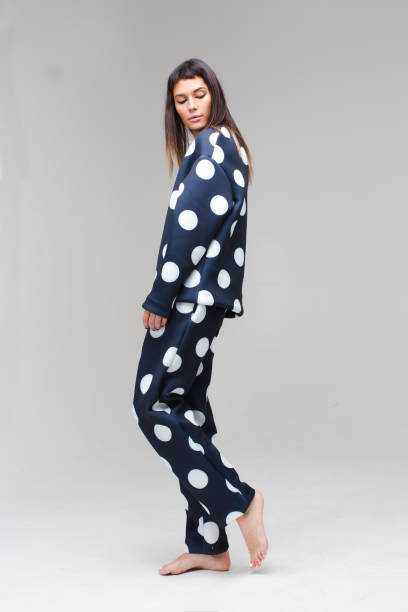 Model posing in a polka dot costume pajamas