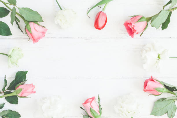 istock Frame with rose flowers and tulip. Flat lay, top view 638685470