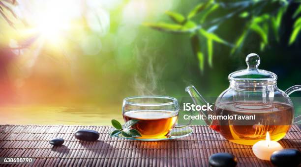 Teatime Relax With Hot Tea In Zen Garden Stock Photo - Download Image Now - Teapot, Tea Cup, Black Tea