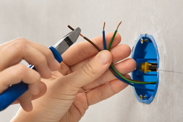 istock hand striping the insulation of wires 638688860