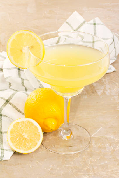 istock Fresh lemon refreshment drink with citrus slice on vintage backg 638690720