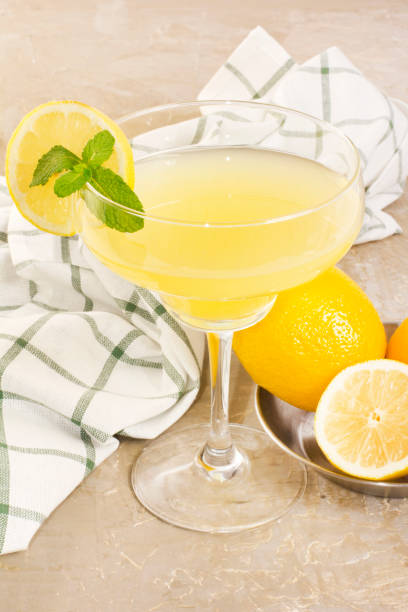 istock Fresh lemon refreshment drink with citrus slice on vintage backg 638690748