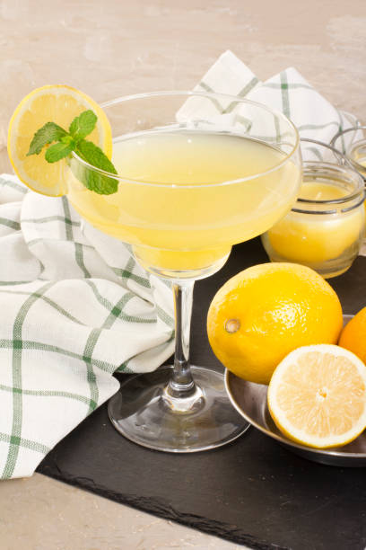 istock Fresh lemon refreshment drink with citrus slice on vintage backg 638690792