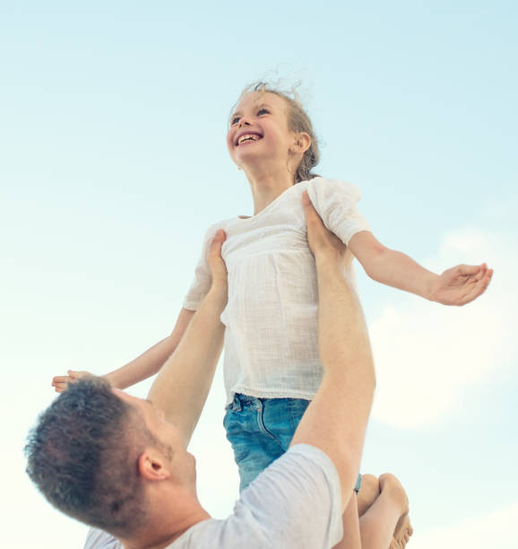 istock Happy family having fun on the beach. 638691216