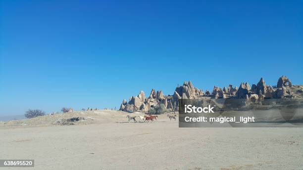 Cappadocia Rock Formations And Horses In Goreme Stock Photo - Download Image Now - Anatolia, Asia, Backgrounds