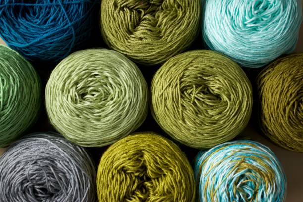 istock Greenery tone Balls wool cotton silk yarn set top view 638695770