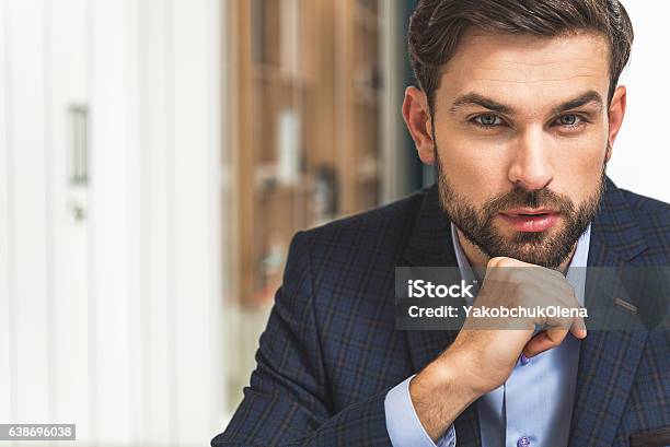 Confident Businessman Planning His Work Stock Photo - Download Image Now - Handsome People, Human Face, Men