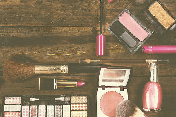 istock Various cosmetics, make-up lie on wooden dressing table. 638699324
