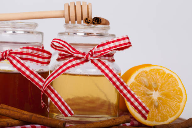 istock Honey in jar on a wooden background 638699914