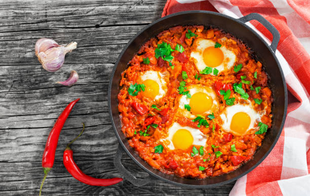istock shakshuka - fried eggs, onion, bell pepper, tomatoes, chili 638703004