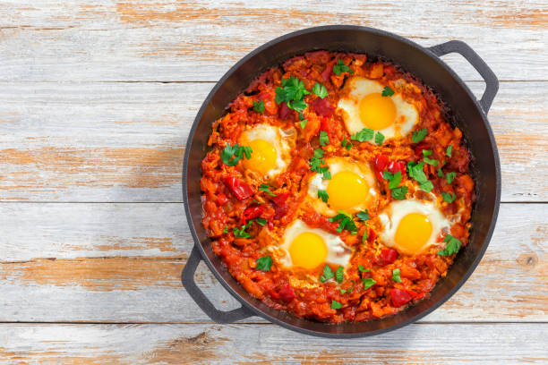 istock shakshuka - fried eggs, onion, bell pepper, tomatoes and spices 638703086