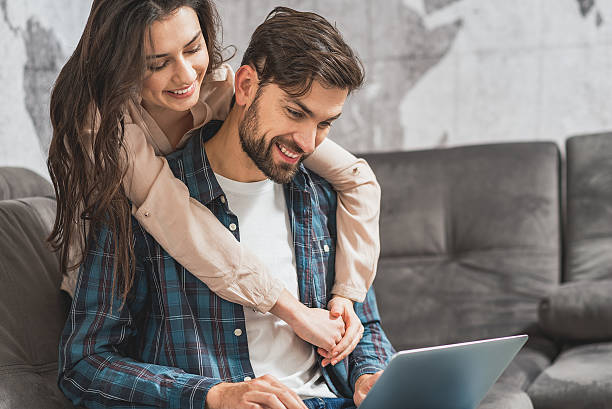 istock Cheerful loving couple enjoying date at home 638703256