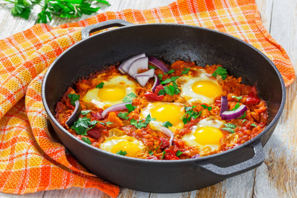 istock fried eggs, onion, bell pepper, tomatoes, chilli and spices 638703324