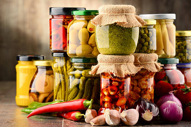 istock Jars with variety of pickled vegetables. 638704780