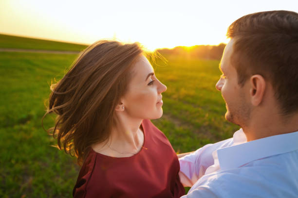 istock boy and girl hugging  play at sunset. love  romantic 638705936