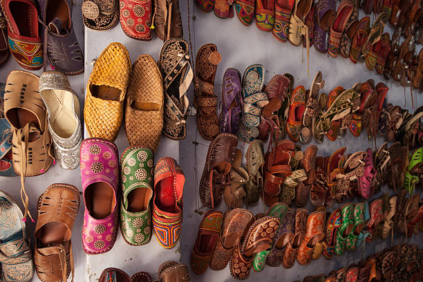 istock Large Group Of Handmade Indian Shoes On Wall 638708140