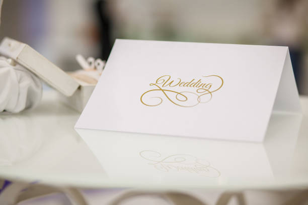 Invitation, greeting or wedding card with white lace and wedding silhouettes.