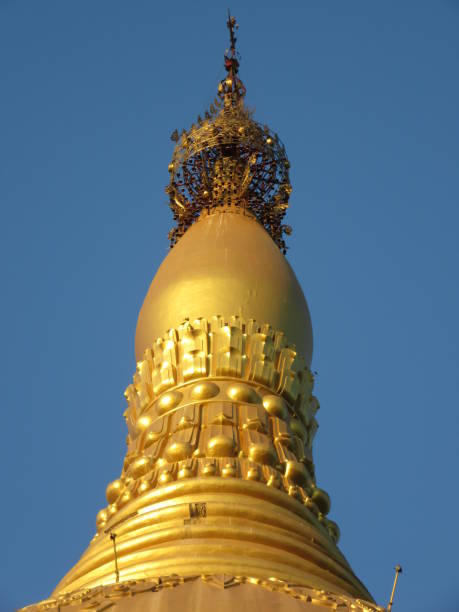 Topmost of White and Gold Stupa, Bago, Myanmar stock photo