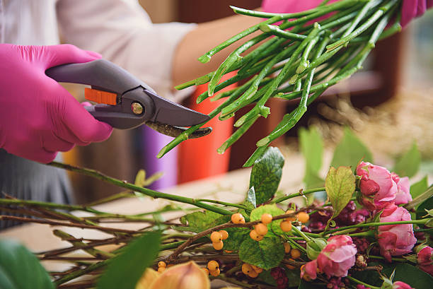 istock Skillful florist creating bouquet in store 638712084