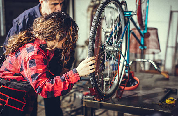 istock Mentor showing her worker how to do repair... 638712528