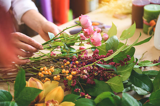 istock Talented woman making bouquet in store 638712628