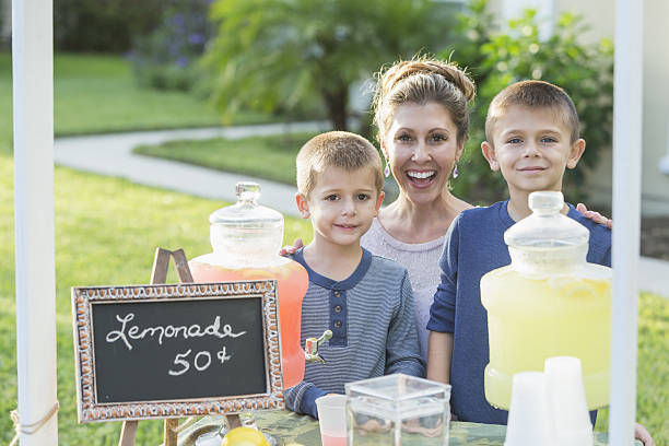 istock Mother and boys with lemonade stand 638712966